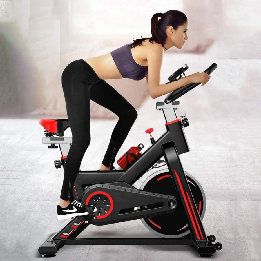 CURSOR FITNESS Pro-Ride Exercise Bike – Silent Belt Drive Indoor Cycling Trainer – Adjustable Resistance & LCD Monitor – Cushioned Seat & Handlebars – Home Cardio Workout Equipment