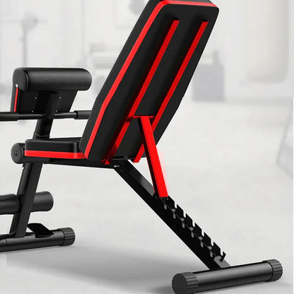 Black and red adjustable weight bench on a light gray background