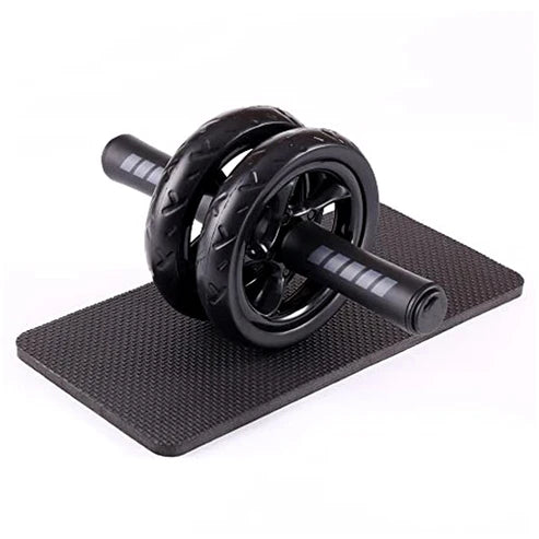 Black ab roller with mat on a white background