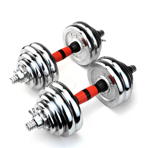 Pair of chrome dumbbells with red and black resistance bands on a white background