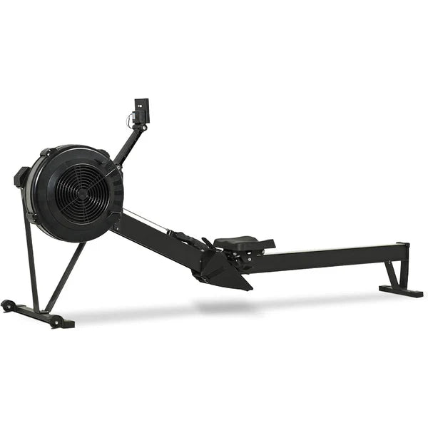 Black rowing machine on a white background