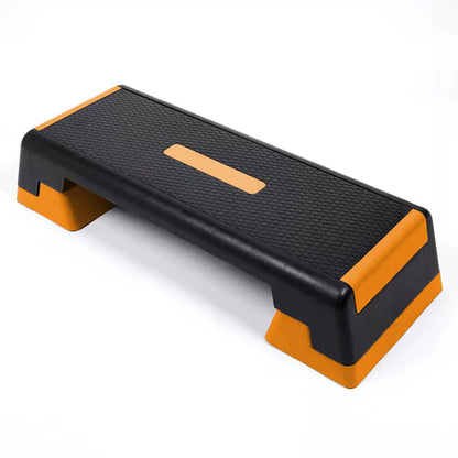 Black and orange step platform on a white background