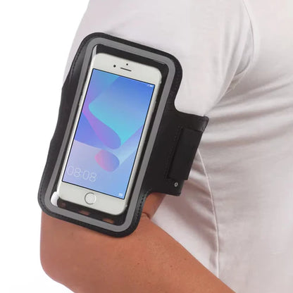 Person wearing a black arm band with a smartphone on a white background