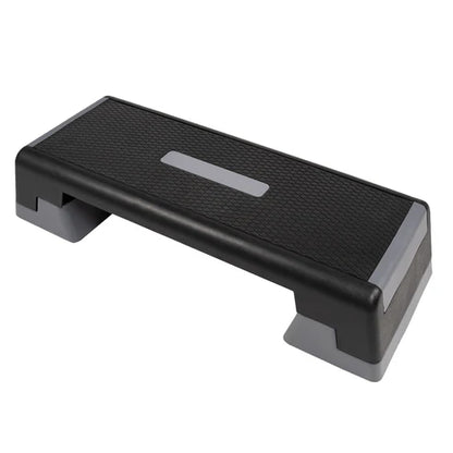 Black and gray step platform on a white background