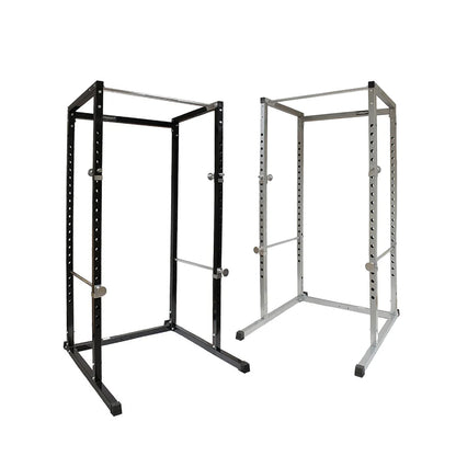 Black and silver power rack on a white background