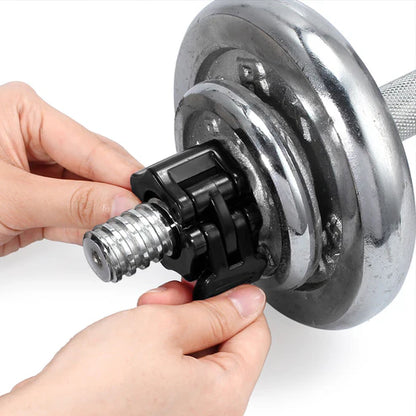 Person adjusting a dumbbell plate on a dumbbell with a white background