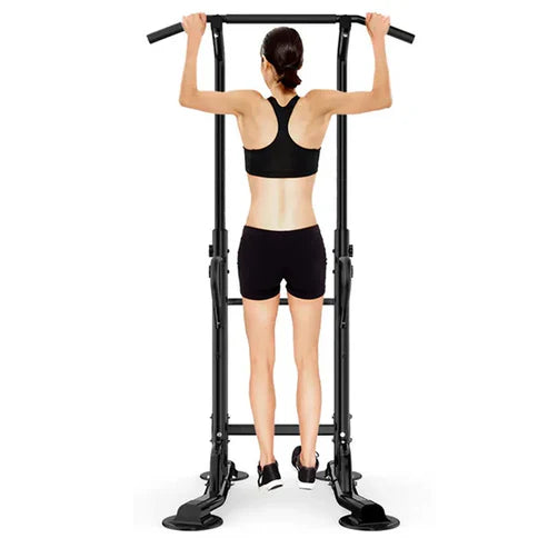 Person using a black pull-up bar on a white background