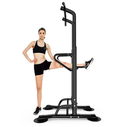 Woman using a black pull-up bar on a white background