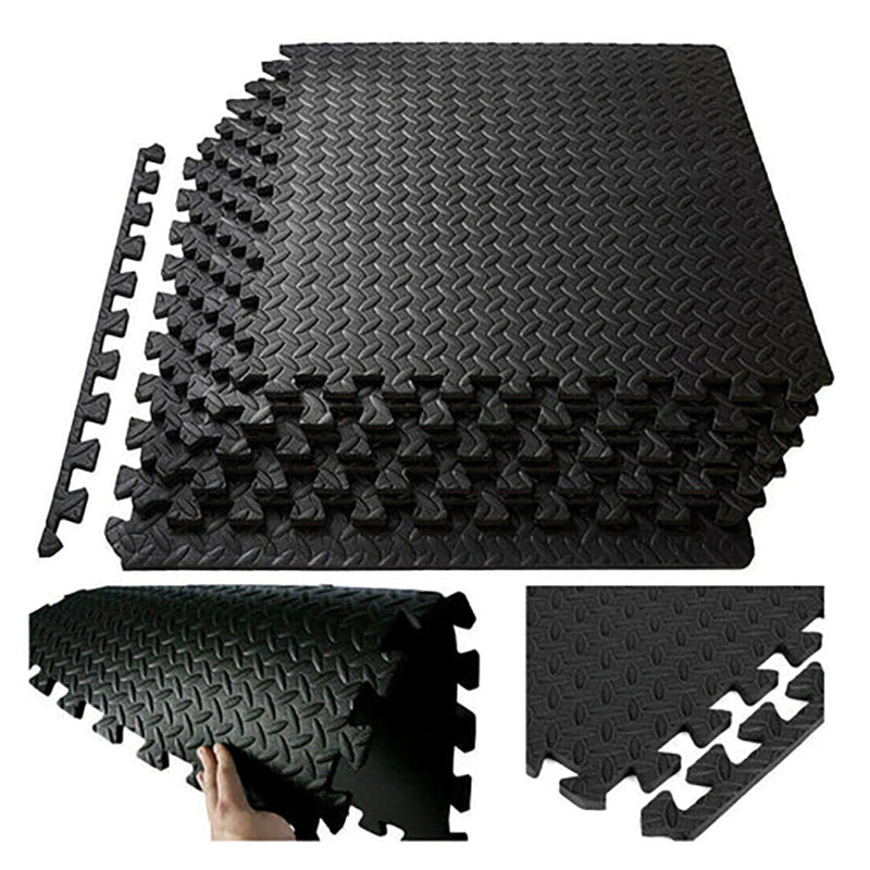 Black foam puzzle mats with interlocking design on a white background