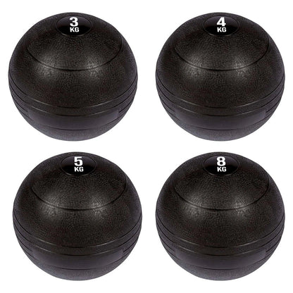 Four black weighted balls with different weights on a white background